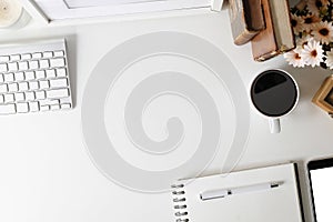 Office desk smartphone mockup, coffee, computer, book and flower