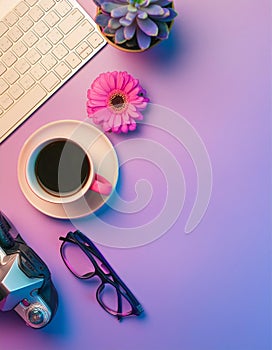 Office desk table with computer, supplies, flower and coffee cup. Top view with copy space