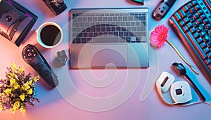 Office desk table with computer, supplies, flower and coffee cup. Top view with copy space