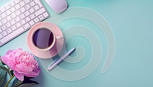 Office desk table with computer, supplies, flower and coffee cup. Top view with copy space