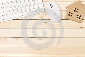 Office desk table of modern workplace with laptop on wooden table, top view laptop background and copy space on wooden background,