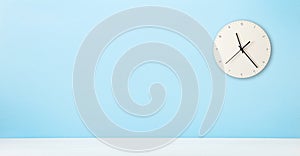 Office desk with wall clock