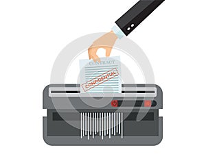 Office device for destruction of documents. Man`s Hand putting paper in shredder machine. Document termination concept. private