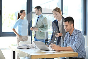 Office employees having business training