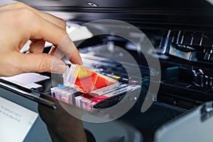 Office equipment maintenance and service - hand replace inkjet printer cartridge