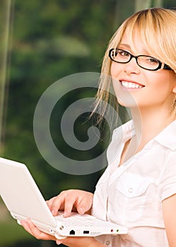 Office girl with laptop computer