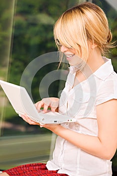 Office girl with laptop computer