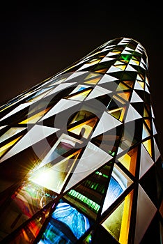 Office glass building in abstract at night