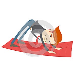 Office hipster man practicing downward facing dog pose