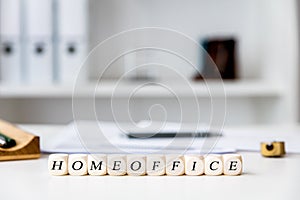 Office at home workplace with dices, english word homeoffice