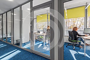 Office interior with glass wall