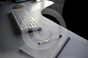 Office Keyboard with Sunset View Through Window
