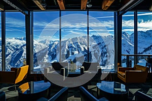 office lounge area with view of snowy peaks