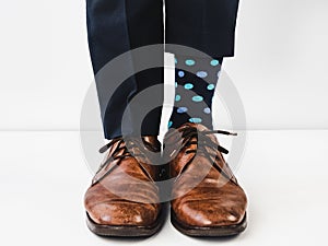 Office Manager in stylish shoes and bright socks