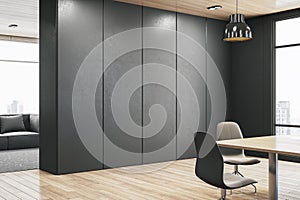 An office meeting room with a blank wall for mockups, modern furniture, and large windows, concept of corporate branding space. 3D