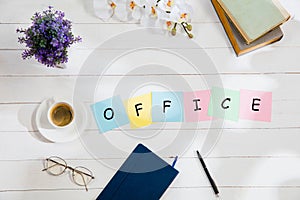 OFFICE. Message at colorful note papers on a desk background.