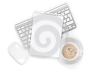 Office notepad over computer keyboard, mouse and coffee cup