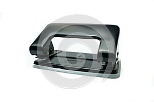 Office paper perforator on white background