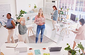 Office, Portrait and busy business woman in startup workspace for marketing agency planning. Creative, productivity and