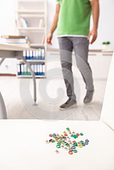 The office prank with sharp thumbtacks on chair