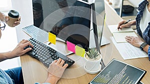 IT office Programmers software development coding technologies On Computer working in a company office