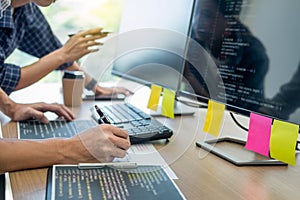 IT office Programmers software development coding technologies On Computer working in a company office