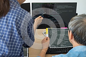 IT office Programmers software development coding technologies On Computer working in a company office