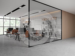 Office room interior with work desk and shelf behind glass partition, window