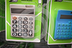 Office and school calculators are available in the store. Close-up.