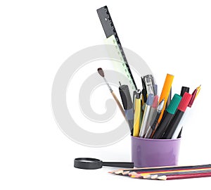 Office and school supplies in the holder.isolated on white background