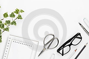 Office and school supplies on white background with copy space