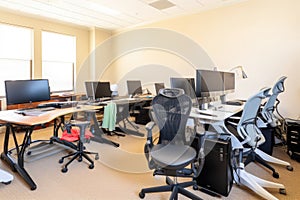 office space with variety of ergonomic products, including chairs, keyboards, and mice