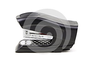 An office stapler isolated on a white background. A Black plastic stapler. Office supplies