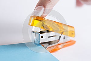 Office stapler ready to staple paper
