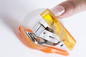 Office stapler ready to staple paper