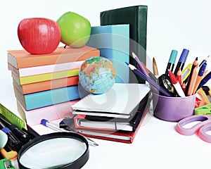 Office and student accessories on a white. Back to school concept.