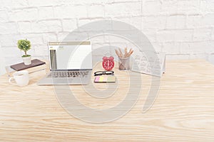 Office stuff stationery with copy space on wooden table and white background