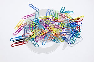 Office supplies colorful concepts, paper clips on white background