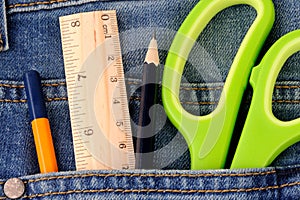 Office supplies on jeans pocket