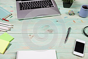 Office table desk with set of colorful supplies