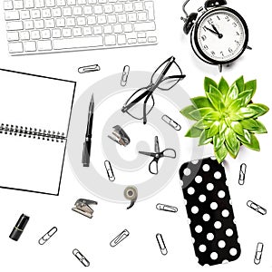 Office table Flat lay Keyboard notebook supplies clock succulent