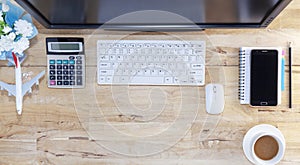 Office table with Objects for business and coffee break on wood background