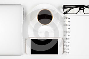 Office table with smartphone and other items