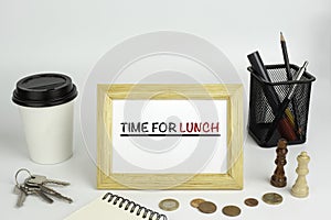 Office table with wooden frame with text - Time for lunch