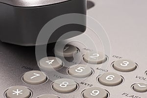 Office telephone. Detail of earpiece and keypad