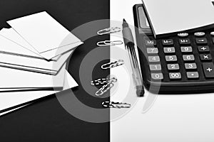 Office tools on black and white background as business concept