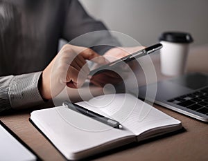 Office tools and gadgets symbolizing an assistant\'s role, featuring items like a notebook, pen, and smartphone, representing photo