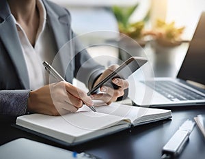Office tools and gadgets symbolizing an assistant\'s role, featuring items like a notebook, pen, and smartphone, representing photo