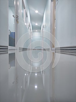 Office tunnel with shiny floor