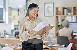 Office woman reading paperwork and happy with profit data and increase at work. Business manager with a bright smile for